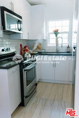 1328 S COCHRAN AVE LOS ANGELES CA 90019 8 units으로 개발 가능성이 있는 수익형 매물 Sell 매물번호 10069 사진 6